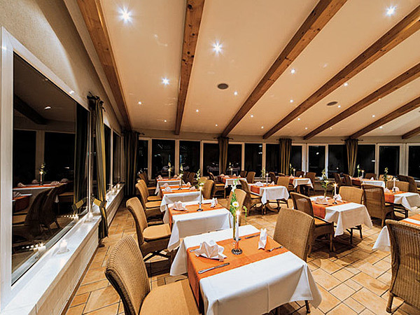 Restaurant mit Wintergarten im Seehotel Heidehof Restaurant mit Wintergarten im Seehotel Heidehof