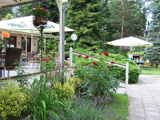 Restaurant mit Café-Terrasse im Aparthotel "Am See" Restaurant mit Café-Terrasse im Aparthotel "Am See"